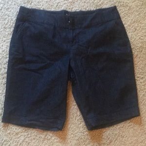 Dark wash Bermuda length denim shorts